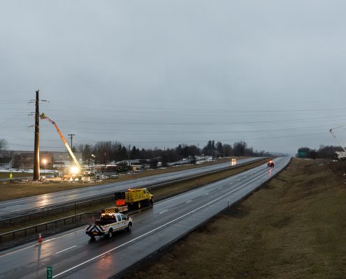 NEAT outside lineman work to fix single pole tower