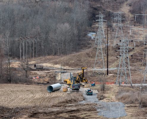 NEAT outside lineman work on transmission field